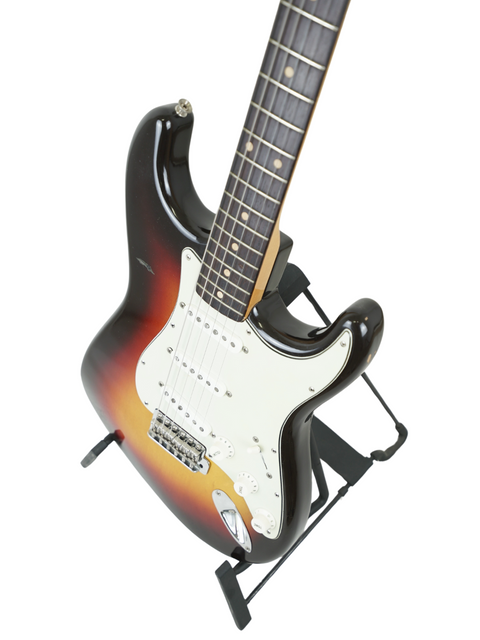 1961 USA Fender Stratocaster guitar in a beautiful black and white sunburst finish, perfect for any music lover.