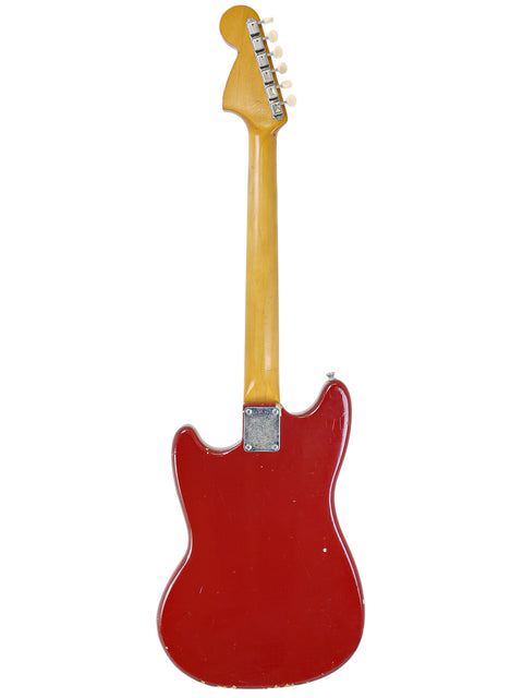 1966 Fender Musicmaster II guitar in red and yellow, blending vintage charm with a unique color combination for music lovers.