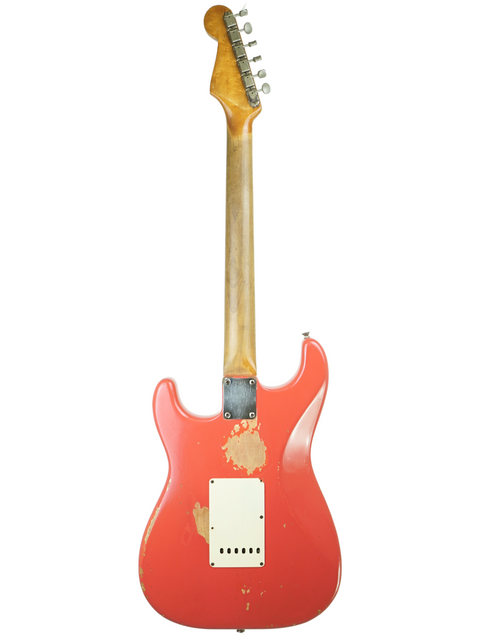A 1963 Fender Stratocaster in Fiesta Red, originally owned by Phil Emmanuel, showcasing its custom shop craftsmanship.
