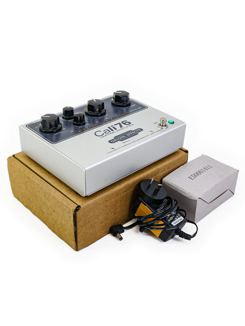 A box featuring the USA-made Cali76-TX compression pedal by Origin Effects alongside a power supply for guitarists.