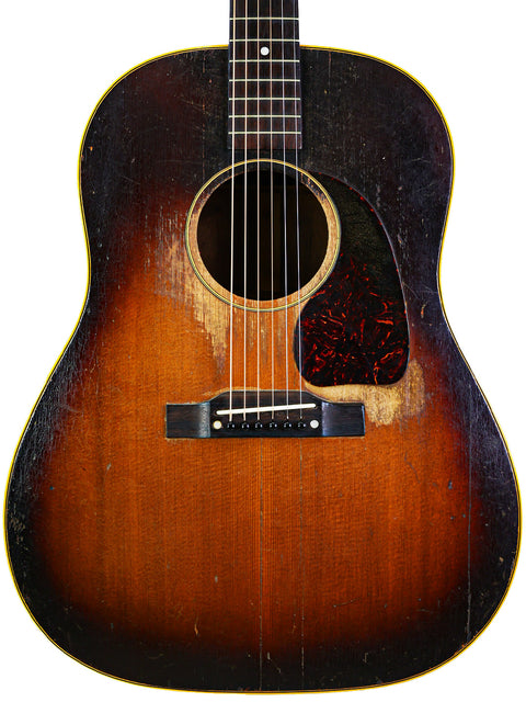 A stunning 1951 Gibson D-28 sunburst guitar, highlighting its vintage charm and exceptional craftsmanship.