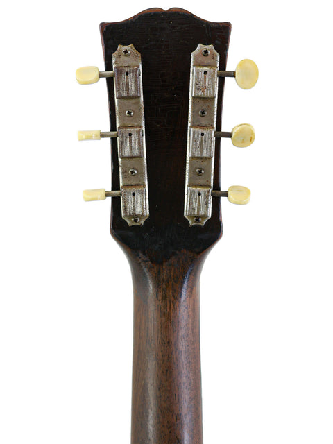 Classic 1961 Gibson Les Paul Custom, representing the pinnacle of vintage guitar design and sound.