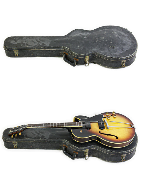 Classic Gibson J-45 guitar, a vintage gem from 1959, known for its warm tones and timeless design, perfect for performances.