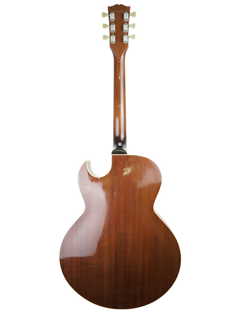 Classic brown Gibson ES-175 guitar from 1986, beautifully contrasted against a simple white backdrop.