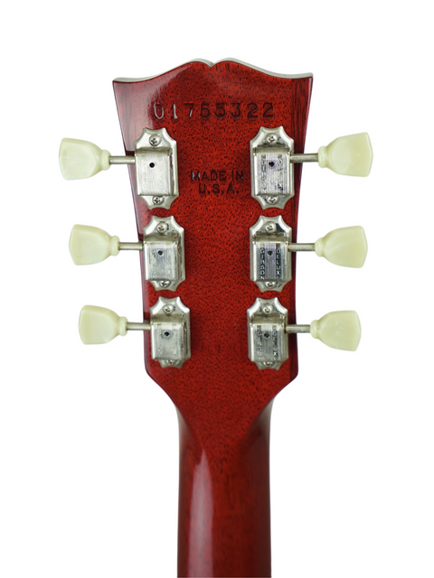 Close-up image of a Gibson Les Paul Standard 60s headstock, emphasizing its elegant design and vintage appeal from 2005.