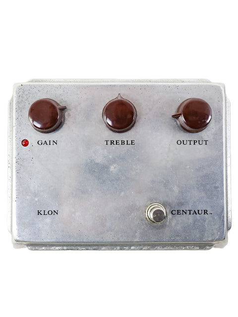 Close-up of a metal box with four knobs, representing the Original Klon Centaur Silver "Non-Horsie," made in the USA, 1999.