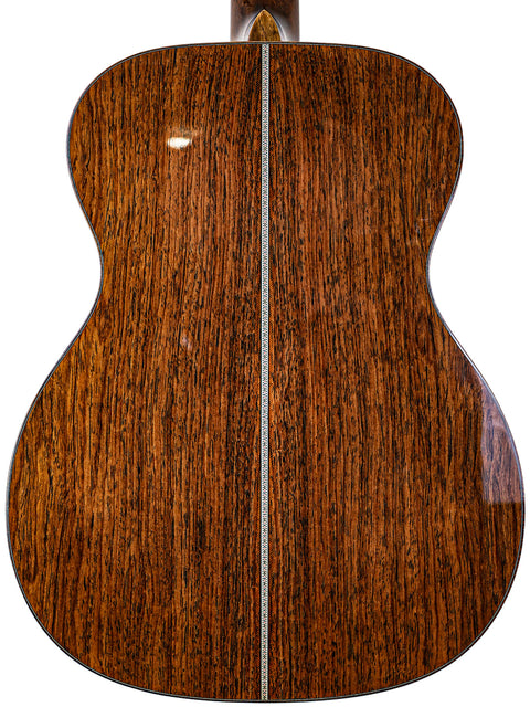 Close-up of an acoustic guitar headstock featuring the "Martin" logo, showcasing the 2019 Custom Shop 000-42 model.