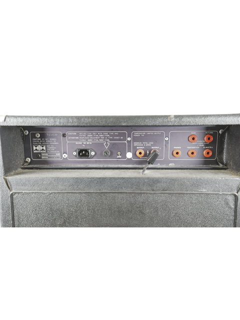 Close-up of the back of an HH Electronics K-80 Keyboard Amplifier, showcasing its connections and robust design.
