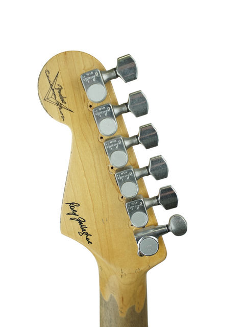 Close-up of the headstock of a 2005 Fender Custom Shop Rory Gallagher Signature Stratocaster Relic electric guitar.