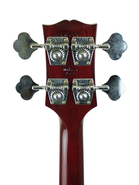 Close-up of the headstock of a 2005 Gibson SG Standard Reissue Bass, emphasizing its elegant design and superior build quality.