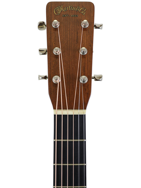 Close-up of the neck of a Martin D-28 CFM IV guitar, showcasing its craftsmanship and limited edition details.