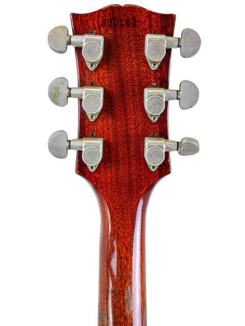 Close-up shot of the headstock on a 1967 Gibson ES-355 Stereo acoustic guitar, featuring intricate details and vintage appeal.