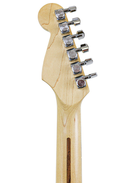 Detailed view of a 1993 Fender Strat Plus Ultra guitar head, highlighting the wooden body and craftsmanship.
