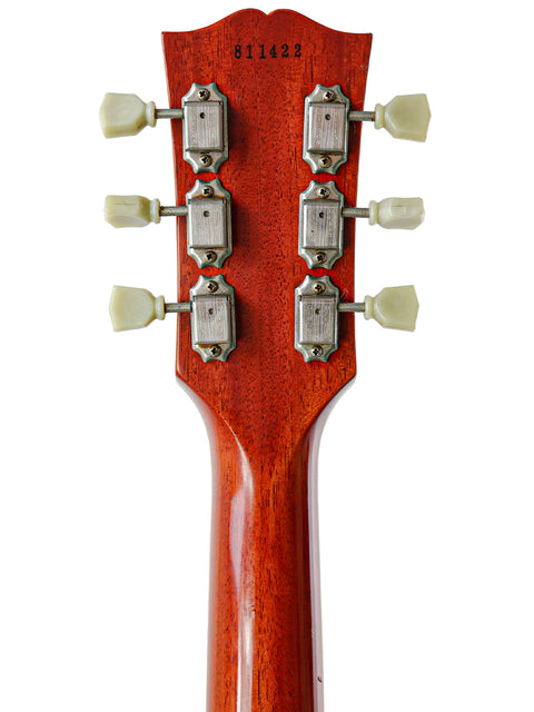 Detailed view of the headstock from a 2011 Gibson Custom Shop LPR-8 1958 Les Paul Reissue electric guitar.