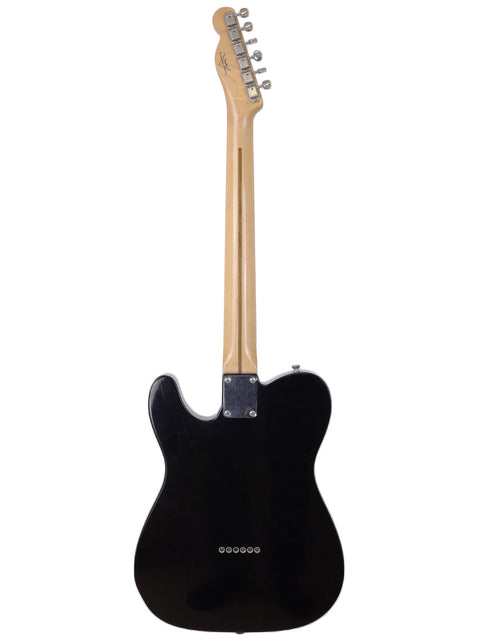 Fender Custom Shop Telecaster Thinline Closet Classic, 2005, featuring a black electric guitar with a wooden body.