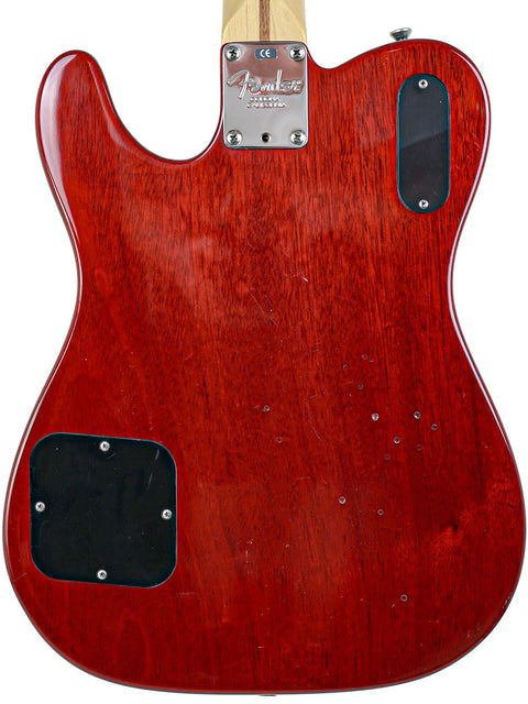 Fender Tele-Sonic guitar in red, with a wooden body and black pickguard, produced in the USA in 2001.