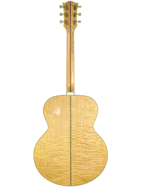 Gibson SJ-200 guitar from 1999 featuring a wooden back and neck, showcasing its classic craftsmanship and design.