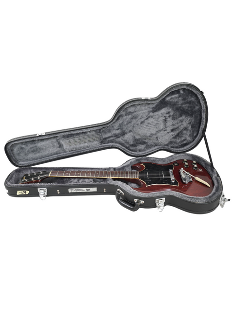 Inside a guitar case, a red vintage Gibson SG Special from 1967 is displayed, highlighting its iconic design and craftsmanship.