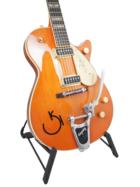 Limited edition Gretsch Roundup 6121W Reissue guitar from Japan 2003, showcasing a signature for a personal touch.