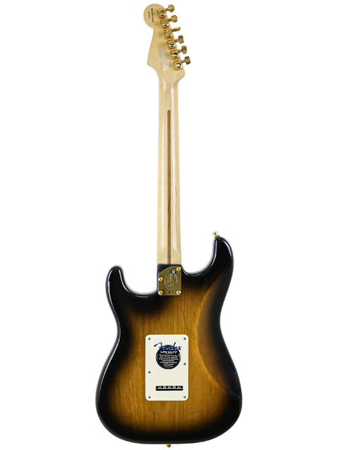 Rear view of a Fender electric guitar with sunburst finish and maple neck.