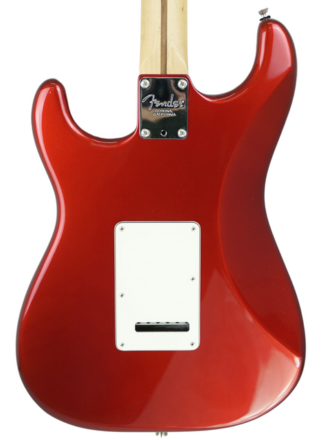 Red Fender electric guitar body viewed from the back.