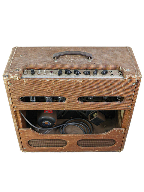 Retro Fender Bassman amplifier, USA-made in 1959, featuring a unique wooden case that highlights its vintage style.