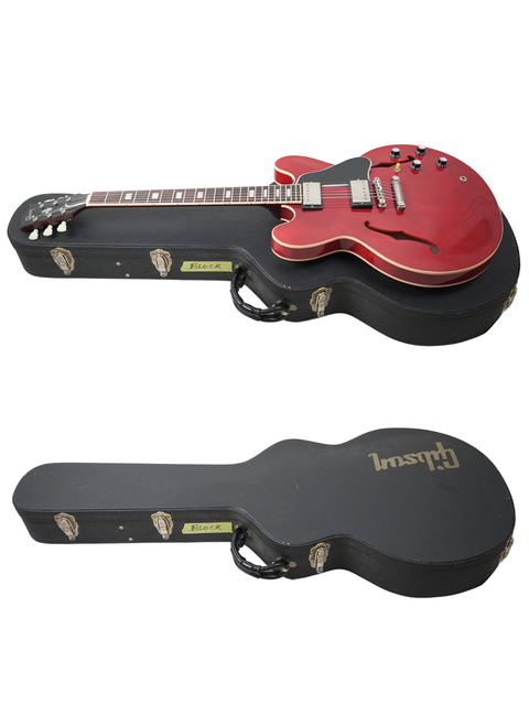 Showcase your passion with two guitars, including a vibrant red Gibson ES-335 Block '63 Reissue, ideal for any guitarist.