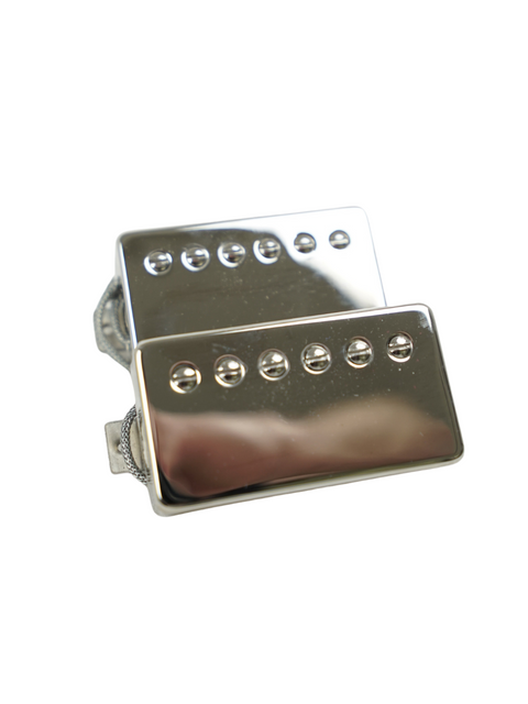 Side-by-side Amber Spirit of '59 pickups with polished chrome covers, emphasizing their classic PAF style.