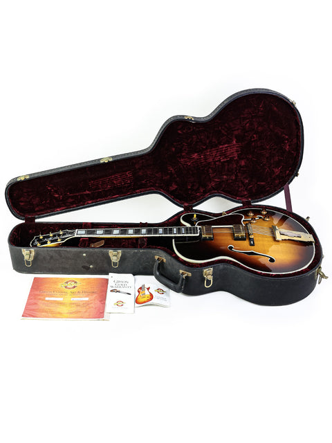 Stunning Gibson L-5 CES guitar in a protective case, highlighting its beauty and quality from the USA, 2002 model.