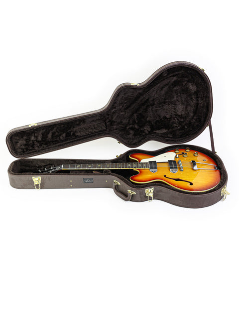 Sunburst-finished guitar case for a 1965 vintage Epiphone Casino, highlighting its iconic style and craftsmanship.