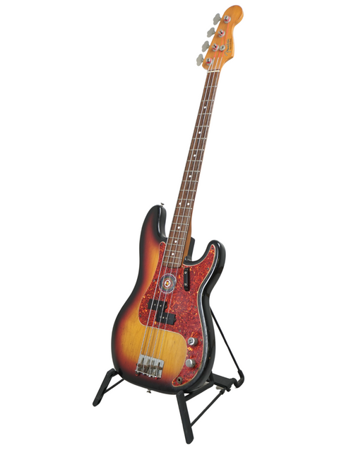 Sunburst electric bass guitar on a stand against a white background.