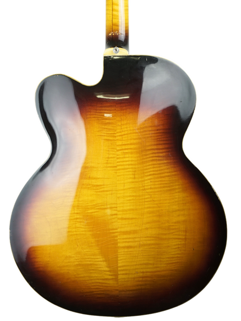 The back of a 1966 vintage Gibson Johnny Smith guitar featuring a striking sunburst finish.