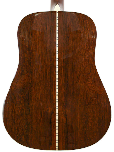 The wooden back of a Martin D-28 CFM IV guitar, highlighting its craftsmanship, from the 55th Birthday Limited Edition.