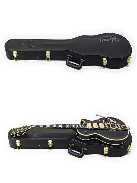 Two black cases and a black Gibson Custom Jimmy Page Les Paul Custom guitar, limited edition 467/500 from 2008.