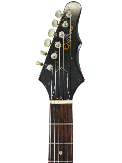 Vintage 1966 Epiphone Wilshire guitar in close-up, highlighted by a bright white background.