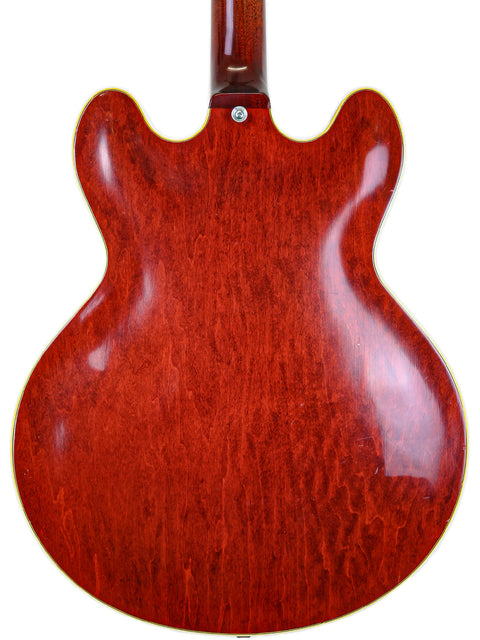 Vintage 1967 Gibson ES-355 Stereo guitar in red, displayed from the back on a white background.