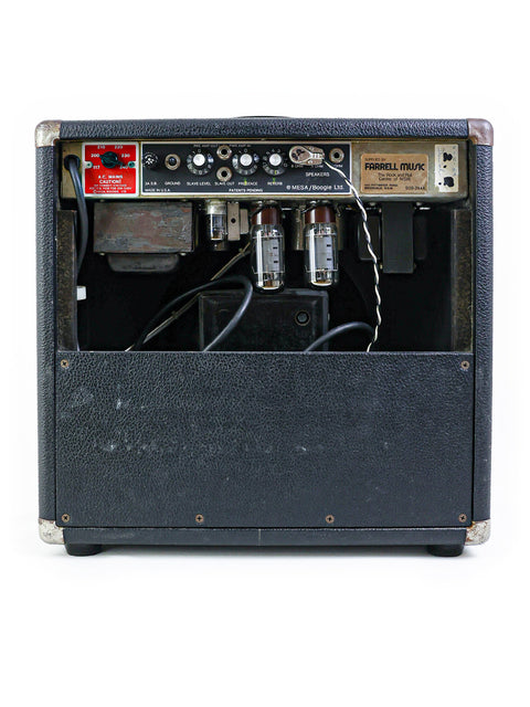 vintage Mesa Boogie Mark IIA Combo guitar amplifier from 1979, featuring a speaker and a microphone for live performances.