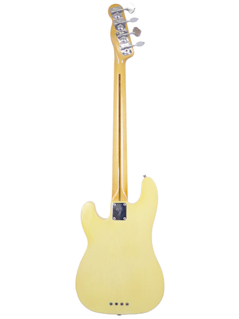 1968 Fender Telecaster Bass in yellow, displayed on a stark white background.