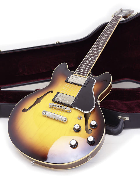 2009 Gibson Custom Shop ES 339 Memphis guitar with its case, displayed on a white backdrop.
