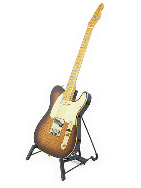 A Fender 40th Anniversary Telecaster guitar on a stand against a clean white background, showcasing its limited edition design.