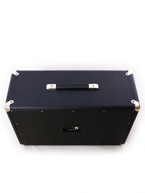 A modern black case equipped with a metal handle on top, representing the Achillies 2x10 Extension Cabinet, Australia 2022.