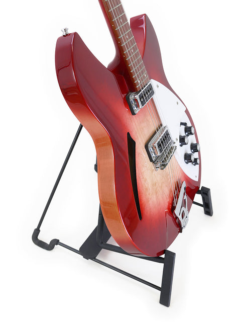 A red Rickenbacker 330 guitar from 2006, in Fireglo finish, positioned on a stand, ready for performance.