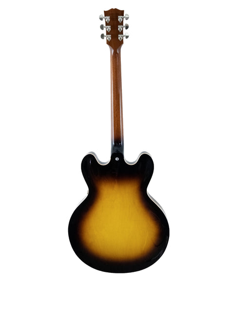 A stunning Gibson Custom ES-335 guitar featuring a sunburst finish and dot inlays, highlighting its 2012 USA craftsmanship.