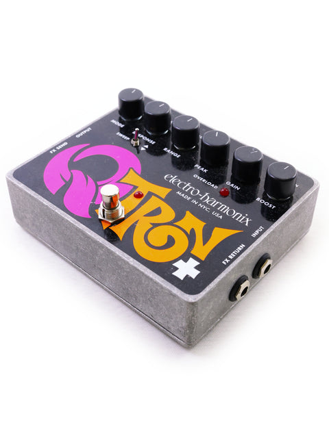 An Electro-Harmonix Q-Tron effects pedal for guitar with knobs and switches, isolated on white background.