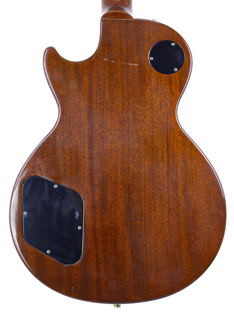 Back view of a Gibson Les Paul Classic 1960 Reissue guitar, showcasing its polished wooden body and elegant craftsmanship.
