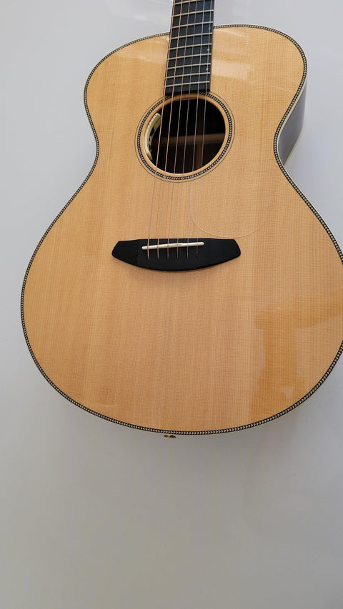 Breedlove Journey Concert Ltd guitar featuring a wooden body and black pick guard, limited edition #22 of 50 from 2016.