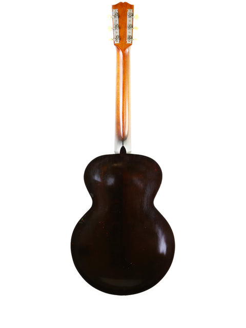 Brown Gibson L-1 guitar, a vintage piece from 1920, prominently featured against a simple white backdrop.