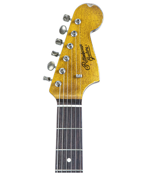 Close-up shot of a Rittenhouse JM-63 guitar, emphasizing the bright yellow neck and intricate details of the instrument.