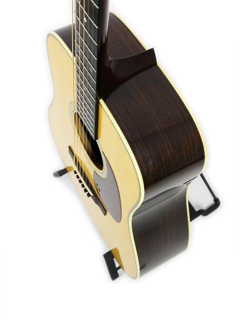 Collings D2H guitar from 2006 displayed on a clean white background, showcasing its elegant design and craftsmanship.