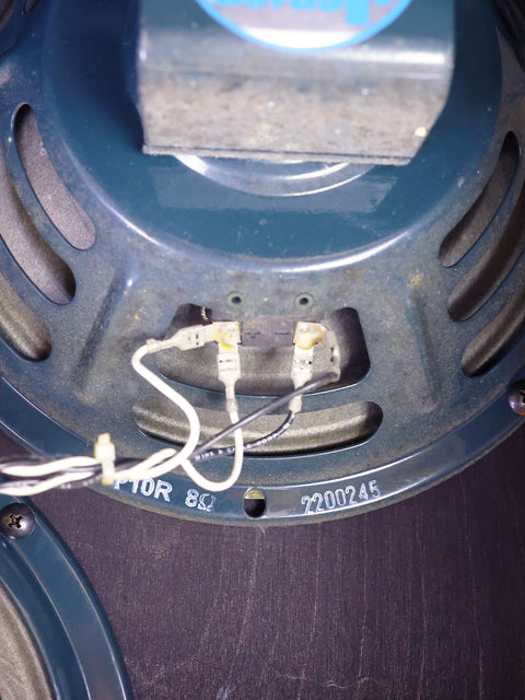Detailed view of a 2003 Fender Custom Shop Vibro-King Combo Amp speaker, featuring visible wires connected.